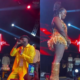 A photo of Arrow bwoy kneeling down to apologise to Nadia Mukami. Photo/ NGC