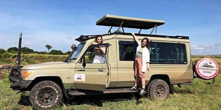 A photo showing Tourists in a Bateleur Eagle Safaris Limited Van during a tour in Kenya. Photo / Bateleur Eagle Safaris Limited
