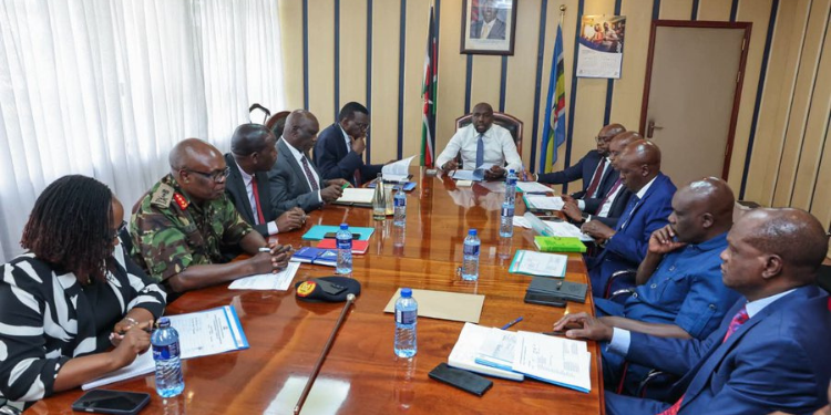 A photo showing members present during the meeting discussing on measures to be administered during the construction of Iisolo- Mandera road. Photo/ Road and Transport Ministry / X