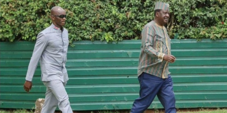 A photo of the late former Prime Minister Raila Odinga with his bodyguard Maurice Ogeta. Photo/ NTV