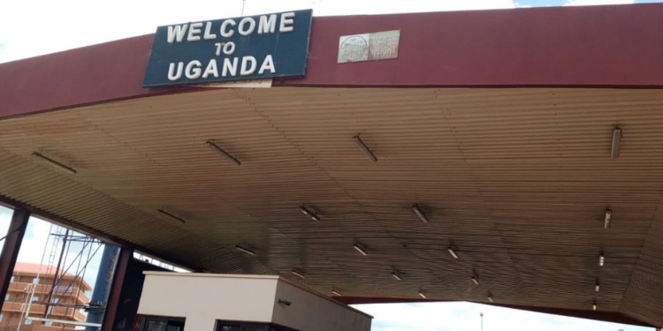 “Welcome to Uganda” sign at the Busia Border Post.