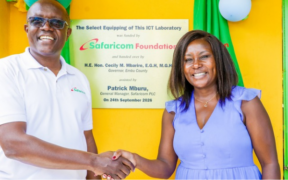 Patrick Mburu, General Manager at Safaricom PLC, and Embu County Governor Cecily Mbarire at the handover of an equipped ICT laboratory. PHOTO/File