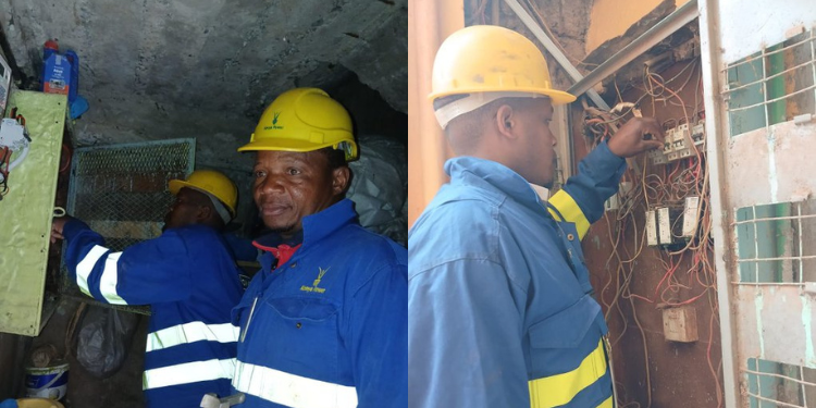 A photo showing technicians from Kenya Power working on power outage in an area . Photo/ Kenya Power
