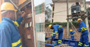 A photo showing technicians from Kenya Power working on power outage in an area . Photo/ Kenya Power