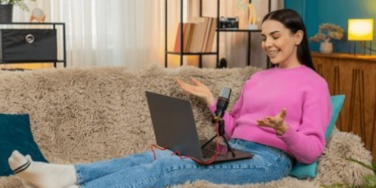 A photo shows a creater recording a podcast at home. PHOTO/ Shutterstock