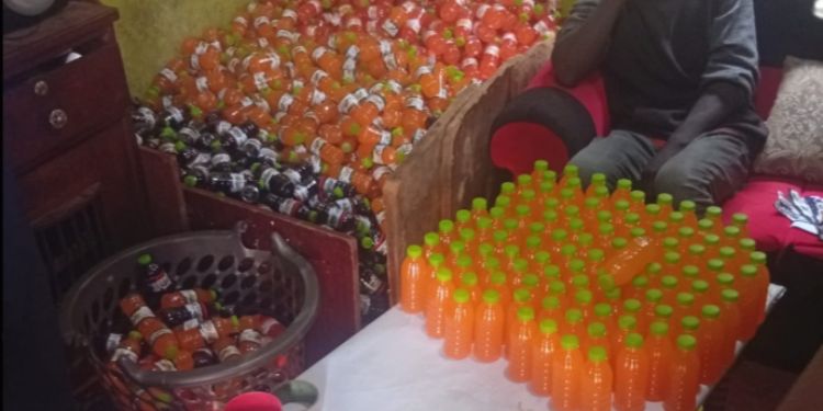 counterfeit juice bottles seized by police during a raid at a homestead in Muthua, Kabete. PHOTO/ DCI