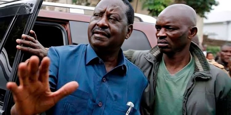 The late Raila Odinga with his Bodyguard Maurice Ogeta. Photo/ Nation