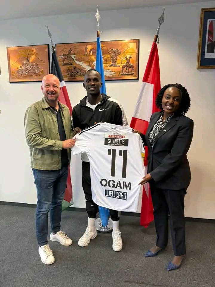 Ogam at the embassy with his agent and Kenya's ambassador Photo/FB