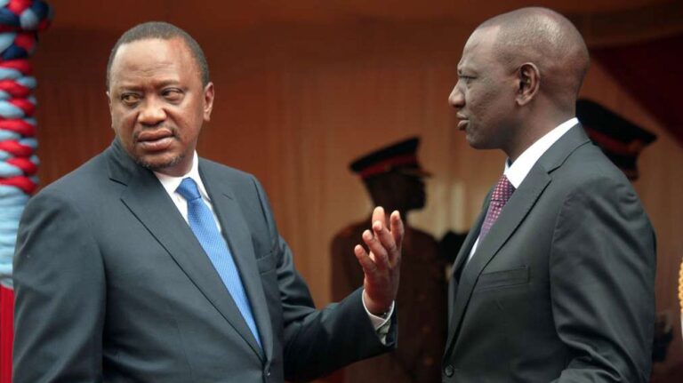 President Uhuru Kenyatta (left) chats with his deputy William Ruto during a past public function in Nairobi. PHOTO | FILE