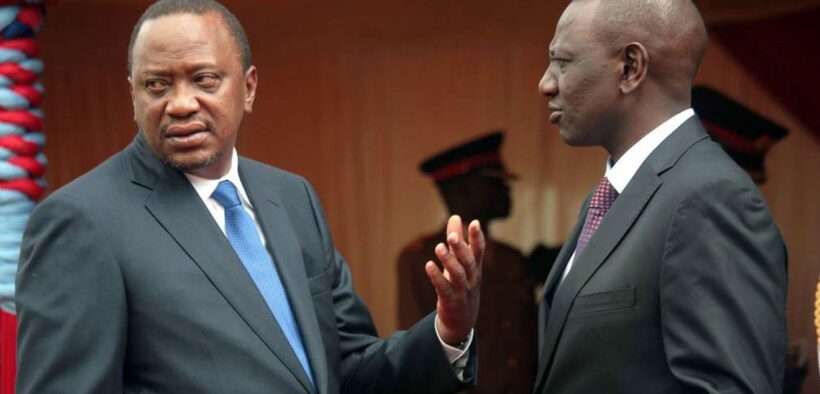 President Uhuru Kenyatta (left) chats with his deputy William Ruto during a past public function in Nairobi. PHOTO | FILE
