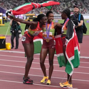 Faith Kipyegon with fellow athletes at the World Athletics Championship in Tokyo. PHOTO/ World Athletics 