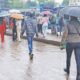 Nairobi residents walking on rainy season. PHOTO/ The Star
