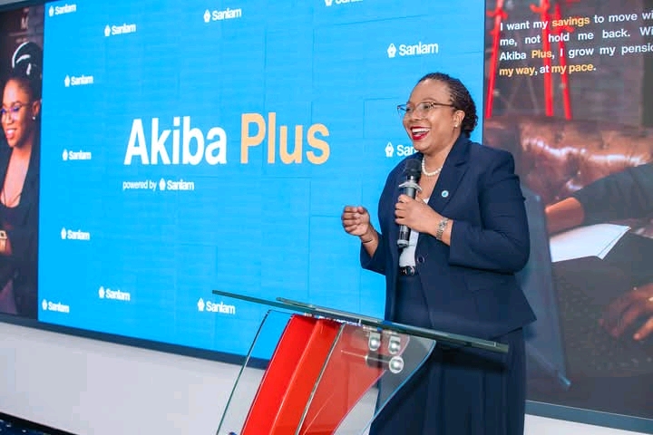 Sanlam Life's Head of Innovations, Isaac Mwangi (left), with Sanlam Life CEO Jacqueline Karasha (centre) and the firm’s Head of Retirement Benefits, Jack Marwa, share a light moment at the Sanlam Akiba Plus pension solution launch