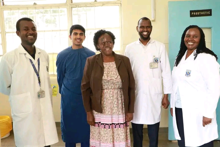 KNH doctors and Dormitila after surgery completion. PHOTO/KNH FB