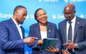 Sanlam Life's Head of Innovations, Isaac Mwangi (left), with Sanlam Life CEO Jacqueline Karasha (centre) and the firm’s Head of Retirement Benefits, Jack Marwa, share a light moment at the Sanlam Akiba Plus pension solution launch