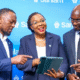 Sanlam Life's Head of Innovations, Isaac Mwangi (left), with Sanlam Life CEO Jacqueline Karasha (centre) and the firm’s Head of Retirement Benefits, Jack Marwa, share a light moment at the Sanlam Akiba Plus pension solution launch