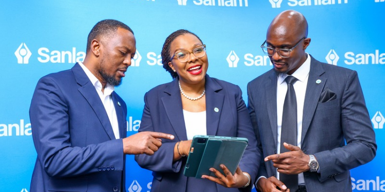 Sanlam Life's Head of Innovations, Isaac Mwangi (left), with Sanlam Life CEO Jacqueline Karasha (centre) and the firm’s Head of Retirement Benefits, Jack Marwa, share a light moment at the Sanlam Akiba Plus pension solution launch