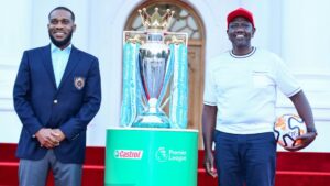 Kenyan President William Ruto and Former Nigerian Footballer Jay-Jay Okocha with the English Premier League (EPL) Trophy.