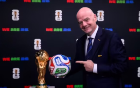 FIFA president Gianni Infantino with the FIFA World Cup trophy and the Official Match Ball of FIFA World Cup 26. PHOTO/Inside FIFA.