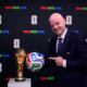 FIFA president Gianni Infantino with the FIFA World Cup trophy and the Official Match Ball of FIFA World Cup 26. PHOTO/Inside FIFA.