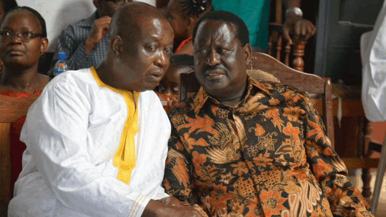 ODM leader Raila Odinga (left) and his brother, Dr Oburu Oginga during the Christmas service at St Peter Nyamira ACK church in Bondo on December 25, 2018. PHOTO | ONDARI OGEGA