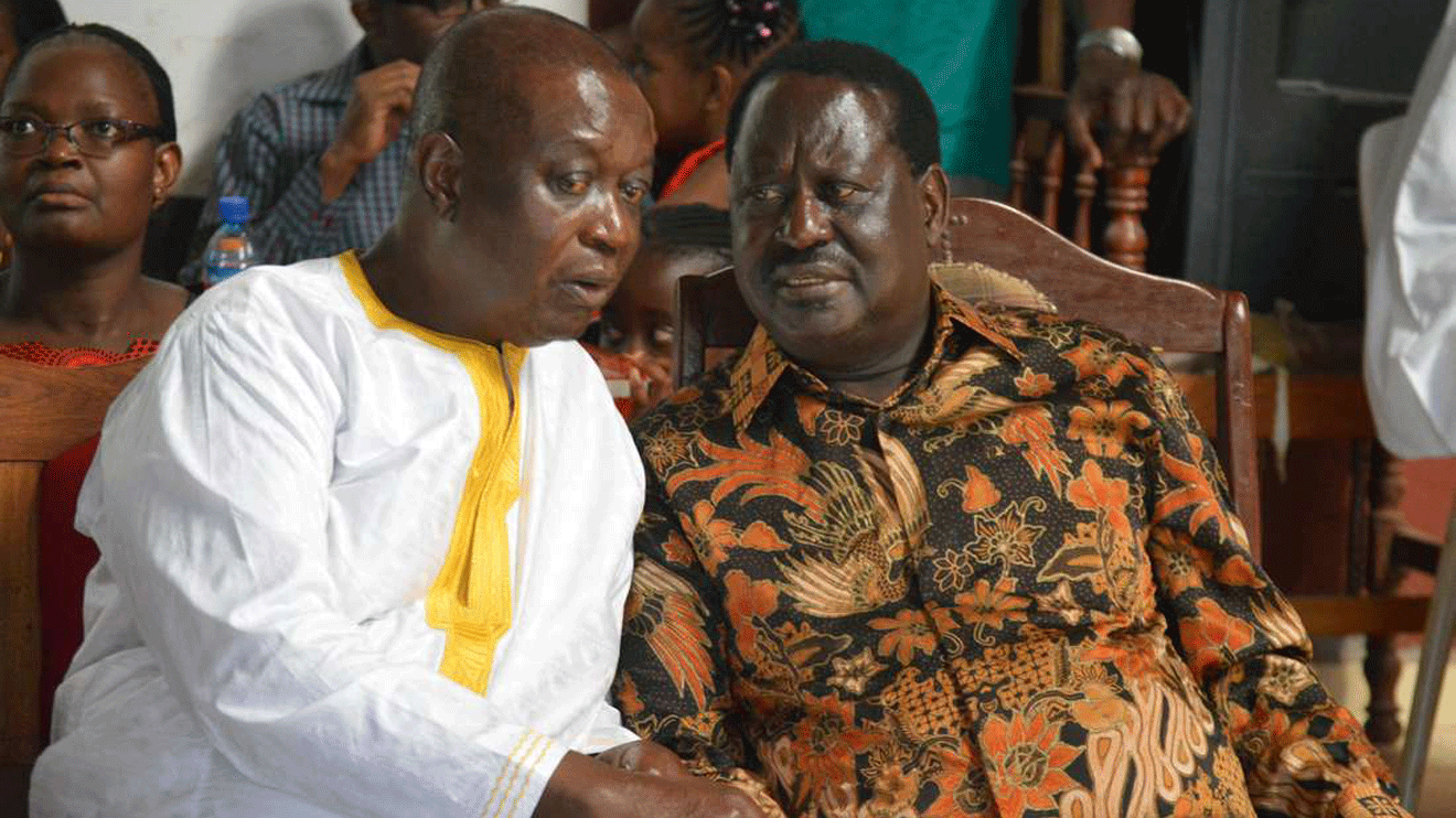 ODM leader Raila Odinga (left) and his brother, Dr Oburu Oginga during the Christmas service at St Peter Nyamira ACK church in Bondo on December 25, 2018. PHOTO | ONDARI OGEGA