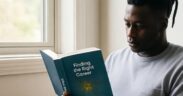 A man reading a book titled: Finding the Right Career Path. PHOTO/Grok.