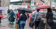 Nairobi residents walking in the rain. PHOTO/FILE