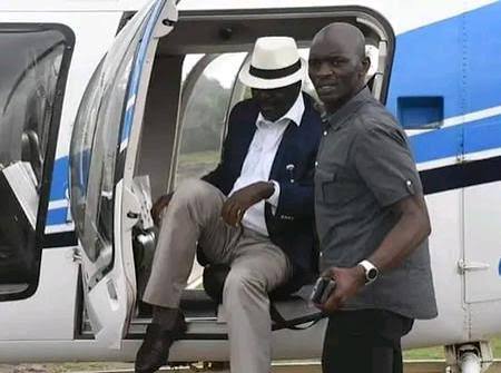 Maurice Ogeta and Raila Odinga alighting from the plane. PHOTO/ HUZ M