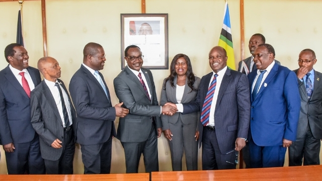 University union officials led by Uasu secretary general Constantine Wasonga and Kusu's Charles Mukhwaya with Education CS Julius Ogamba after the talks, November 4, 2025. /JULIUS OGAMBA/X