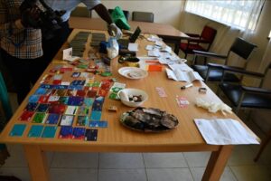 Some of The Items Used by the Three- Nigerians in the Alleged Cyber-related Syndicate. PHOTO/ DCI X