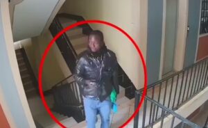 CCTV camera showing the delivery rider carrying a package at Maridian Apartment. PHOTO/CCTV Footage Screenshot