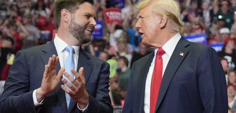 Former President Donald Trump and Republican vice presidential candidate Sen. J.D. Vance, R-Ohio, arrive a campaign rally on Saturday in Grand Rapids, Mich. Evan Vucci/A