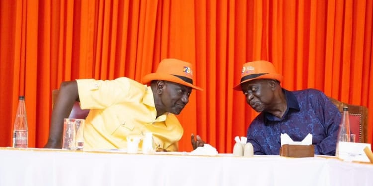 President William Ruto consults with ODM party leader Oburu Oginga during the ODM’S Founders Dinner in Mombasa. PHOTO/ODM. Raila