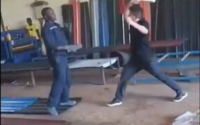 A screengrab of a Chinese citizen assaulting a Kenyan. PHOTO/UGC.