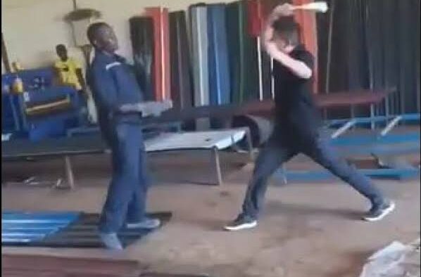 A screengrab of a Chinese citizen assaulting a Kenyan. PHOTO/UGC.