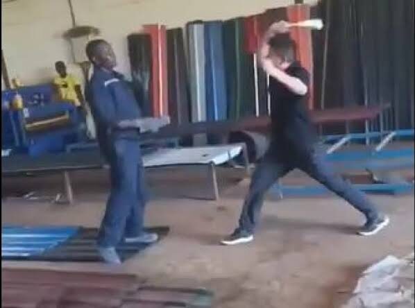 A screengrab of a Chinese citizen assaulting a Kenyan. PHOTO/UGC.