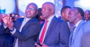 Kenya Revenue Authority (KRA) Commissioner General Humphrey Wattanga (left) takes a selfie with SanlamAllianz Kenya Chairman Dr John Simba (centre) and Insurance Regulatory Authority CEO Godfrey Kiptum (right) at the SanlamAllianz Kenya rebrand ceremony.