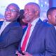 Kenya Revenue Authority (KRA) Commissioner General Humphrey Wattanga (left) takes a selfie with SanlamAllianz Kenya Chairman Dr John Simba (centre) and Insurance Regulatory Authority CEO Godfrey Kiptum (right) at the SanlamAllianz Kenya rebrand ceremony.