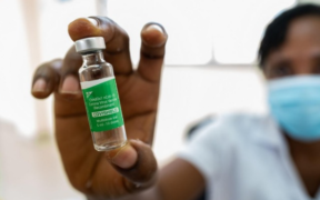 The Image Shows a Healthcare Worker Holding a Vial of the Covishield COVID-19 vaccine. PHOTO/ WHO