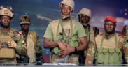 A group of soldiers gives a statement on Benin's national television, claiming to have seized power, following reports of a coup attempt underway against the government of Benin's President Patrice Talon, in Cotonou, Benin, on December 7, 2025. Photo credit: Reuters