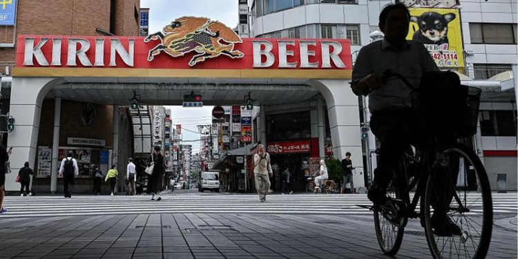 A Japanese Cyclists in one of Japan's Squares. PHOTO/ BBC