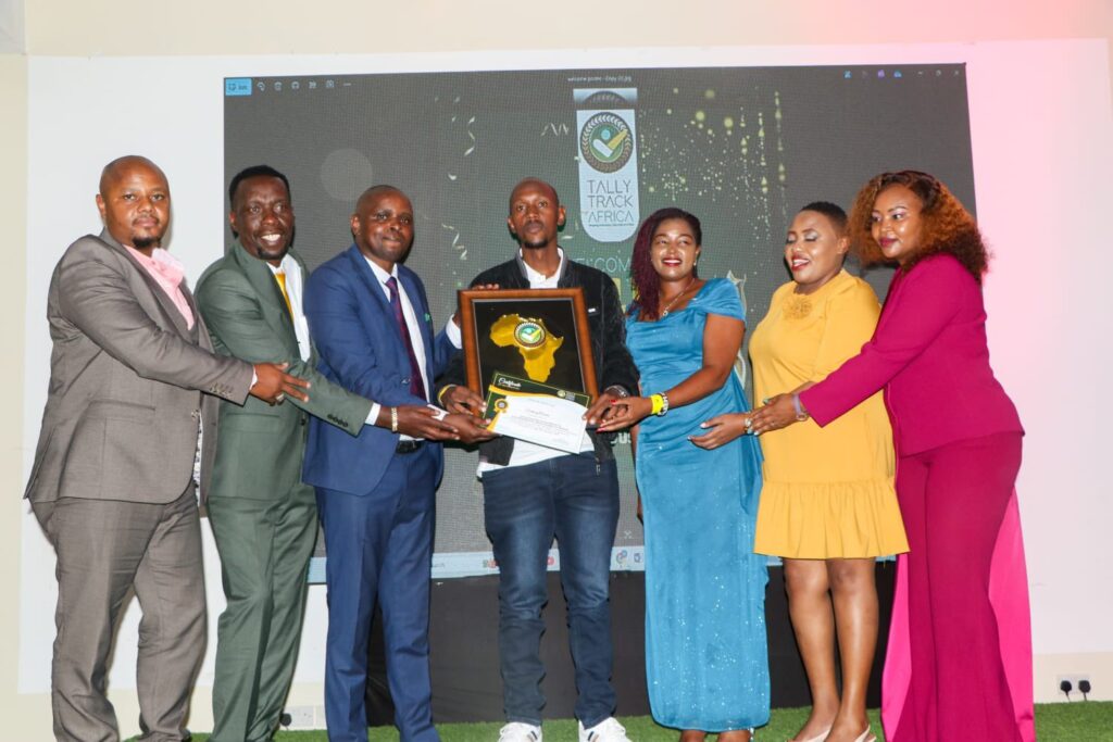 Geoffrey Mosiria receiving prestigious award from Tally Track Africa. PHOTO/Mosiria X
