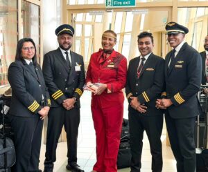 Asha Mohamed with the crew of Kenya Airways. PHOTO/KQ X