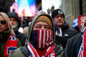 People gather and watch the FIFA World Cup 2026 Draw on a screen in Times Square in New York City, US, December 5, 2025. / Reuters