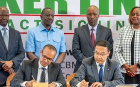 Amsons Group Managing Director, Mr Edha Nahdi (foreground left) and Sinoma CBMI Chairman, Mr Zhang Sicai (fore right), signing the US$250 million Matuga Clinker Factory Construction contract, witnessed by President William Ruto, Bamburi Cement Plc Chairman John Simba, MITI CS Lee Kinyanjui and Bamburi Cement Head of Legal and Company Secretary Joyce Munene.