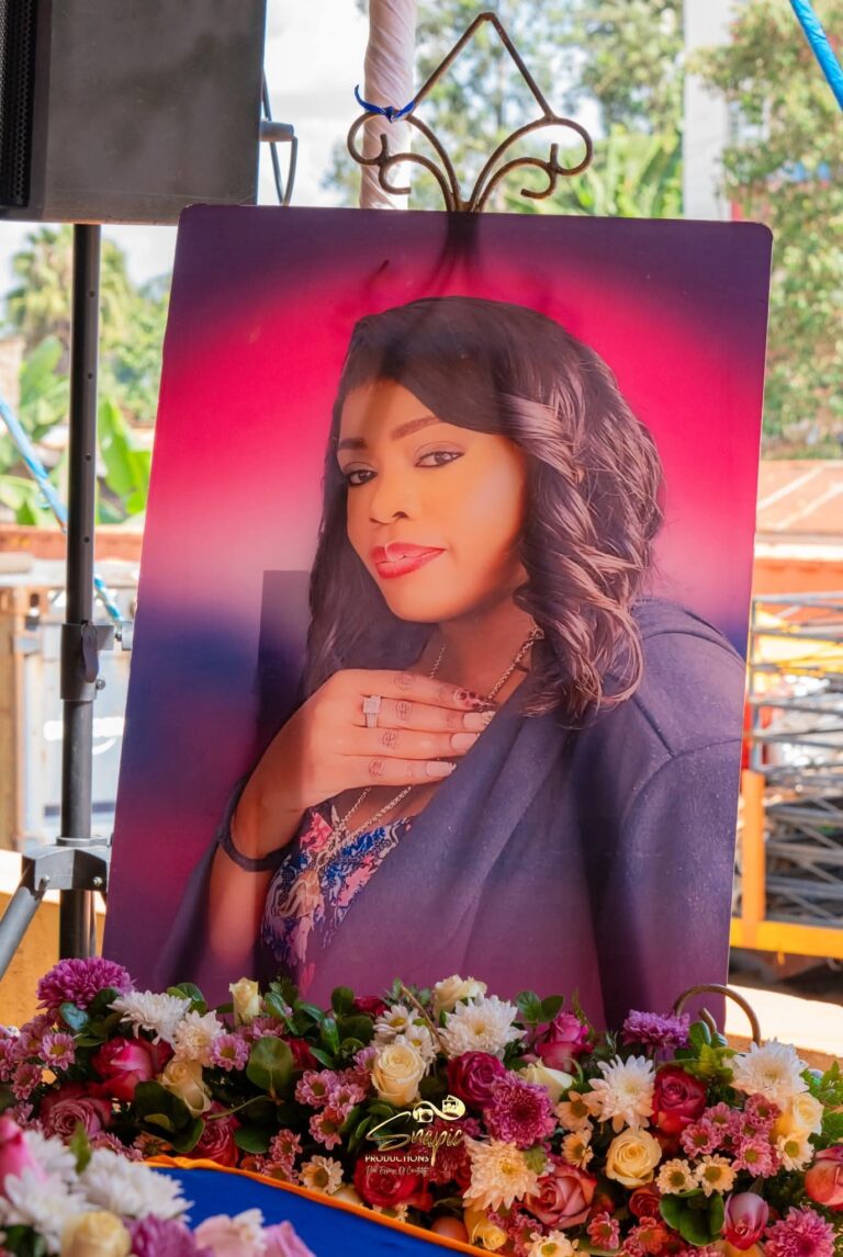 Betty-Bayos-portrait-during-her-burial-service