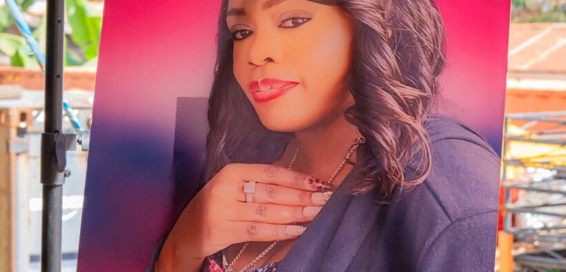 Betty-Bayos-portrait-during-her-burial-service