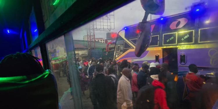 Nairobians queuing waiting to board a bus. PHOTO/Courtesy
