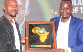 Geoffrey Mosiria receiving prestigious award. PHOTO/Courtesy